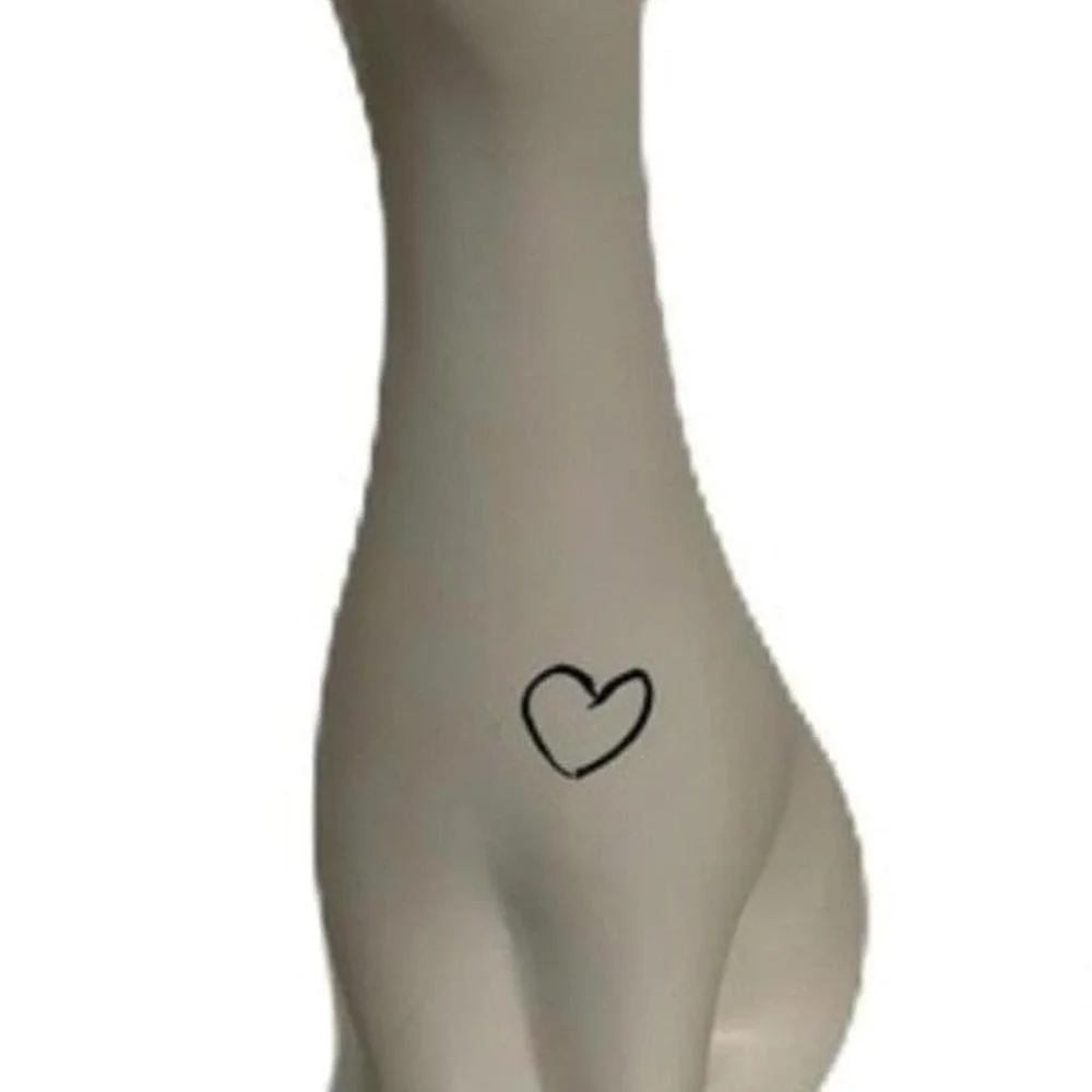 Ceramic Unicorn Home Decoration Figurine adorned with a Heart